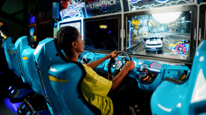 Guest enjoying arcade game